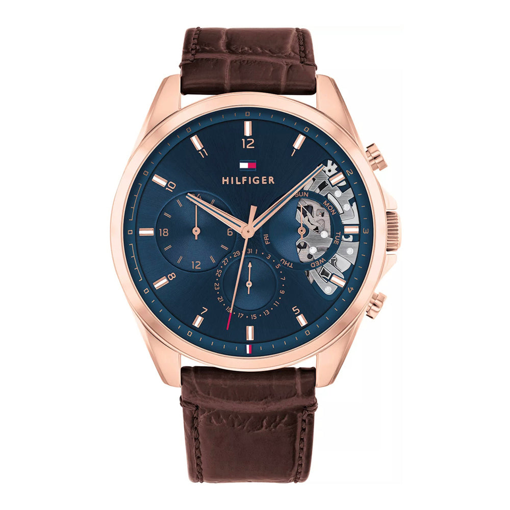 tommy-hilfiger-baker-herrenuhr-1710453-or-teilskelettiert-blau-or-rosegoldenes-gehause-and-braunes-lederarmband-markenuhren-jlr-design-1 - JLR Design