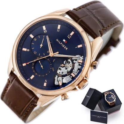 tommy-hilfiger-baker-herrenuhr-1710453-or-teilskelettiert-blau-or-rosegoldenes-gehause-and-braunes-lederarmband-markenuhren-jlr-design-2 - JLR Design