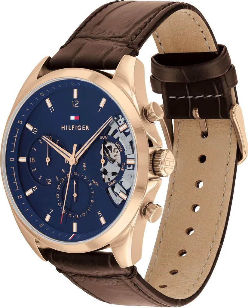 tommy-hilfiger-baker-herrenuhr-1710453-or-teilskelettiert-blau-or-rosegoldenes-gehause-and-braunes-lederarmband-markenuhren-jlr-design-3 - JLR Design